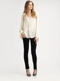 Shoulder cutouts and dramatic bishop sleeves reinvent this lengthy silk go-to. V-neckButton frontLong bishop sleevesButtoned cuffsSilkDry cleanImportedModel shown is 5'10 (177cm) wearing US size Small. Shoulder cutouts and dramatic bishop sleeves reinvent this lengthy silk go-to. V-neckButton frontLong bishop sleevesButtoned cuffsSilkDry cleanImportedModel shown is 5'10 (177cm) wearing US size Small.