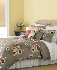 Wake up to a garden in bloom with Martha Stewart Collection's Pastel Poppies comforter set. Bright watercolor blossoms accent carefree floral sketches and stencils for a look that appeals to your artistic sensibility. The comforter reverses to a stencil print. Wake up to a garden in bloom with Martha Stewart Collection's Pastel Poppies comforter set. Bright watercolor blossoms accent carefree floral sketches and stencils for a look that appeals to your artistic sensibility. The comforter reverses to a stencil print.
