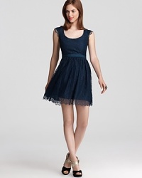 Shoshanna reinterprets a classic lace dress in a rich jewel tone hue, the perfect party frock for every season. Shoshanna reinterprets a classic lace dress in a rich jewel tone hue, the perfect party frock for every season.