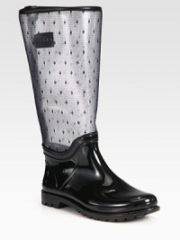 Scattered woven polka dots lend whimsical style to this rainy weather essential with leather trim. Rubber heel, 1 (25mm)Shaft, 13¼Leg circumference, 14½PVC upper with leather trim upper and point d'esprit panelingRubber liningRubber trek solePadded insoleMade in Italy Scattered woven polka dots lend whimsical style to this rainy weather essential with leather trim. Rubber heel, 1 (25mm)Shaft, 13¼Leg circumference, 14½PVC upper with leather trim upper and point d'esprit panelingRubber liningRubber trek solePadded insoleMade in Italy