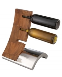 An innovative balance of form and function, the Eclipse wine rack displays up to three bottles in a curve of warm acacia wood. The arched base, crafted in signature Nambe metal, gives your collection a lift and decor a boost. Designed by Neil Cohen. An innovative balance of form and function, the Eclipse wine rack displays up to three bottles in a curve of warm acacia wood. The arched base, crafted in signature Nambe metal, gives your collection a lift and decor a boost. Designed by Neil Cohen.