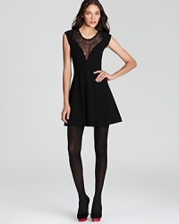 Alluring lace details adorn the front and back of this beautiful French Connection dress with just the right touch of peekaboo flair for special occasions after dark. Alluring lace details adorn the front and back of this beautiful French Connection dress with just the right touch of peekaboo flair for special occasions after dark.
