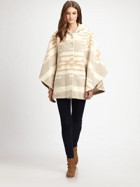 Inspired by Midwestern textiles, this slouchy poncho style will keep you cozy all season long.HoodDropped shouldersOpen sleevesConcealed button frontAbout 30 from shoulder to hem82% wool/18% cottonDry cleanMade in USAPlease note: one size fits all.This style runs true to size. We recommend ordering your usual size for a standard fit. Inspired by Midwestern textiles, this slouchy poncho style will keep you cozy all season long.HoodDropped shouldersOpen sleevesConcealed button frontAbout 30 from shoulder to hem82% wool/18% cottonDry cleanMade in USAPlease note: one size fits all.This style runs true to size. We recommend ordering your usual size for a standard fit.
