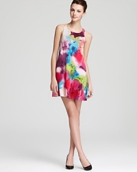 A fluid watercolor floral print wows on this Alice + Olivia dress, complete with a sleek racerback and relaxed silhouette. A fluid watercolor floral print wows on this Alice + Olivia dress, complete with a sleek racerback and relaxed silhouette.