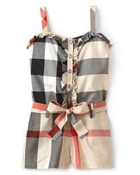 This Burberry romper makes a stylish appearance at both playdates and holiday gatherings alike. This Burberry romper makes a stylish appearance at both playdates and holiday gatherings alike.