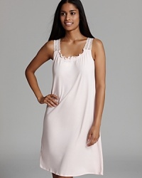 Hanro does the breezy nightgown in a delicate hue with lace straps and a ruffle neckline. Hanro does the breezy nightgown in a delicate hue with lace straps and a ruffle neckline.