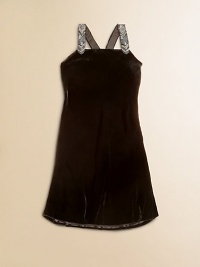 A luxuriously plush velvet dress is highlighted with beaded straps and a sleek silhouette for the perfect party attire.Straight necklineBeaded racerback strapsInvisible side zipperScalloped hemViscose/SilkDry cleanImportedNecklace and gloves shown not sold A luxuriously plush velvet dress is highlighted with beaded straps and a sleek silhouette for the perfect party attire.Straight necklineBeaded racerback strapsInvisible side zipperScalloped hemViscose/SilkDry cleanImportedNecklace and gloves shown not sold
