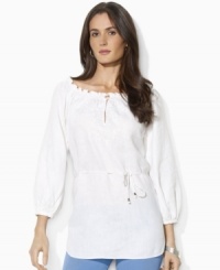 This breezy Lauren by Ralph Lauren petite tunic is rendered in lightweight linen with delicate embroidery and smocking at the neckline for a bohemian look. (Clearance) This breezy Lauren by Ralph Lauren petite tunic is rendered in lightweight linen with delicate embroidery and smocking at the neckline for a bohemian look. (Clearance)