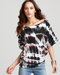 A splashy tie-dye print makes a bold color statement on this Generation love tee. A splashy tie-dye print makes a bold color statement on this Generation love tee.