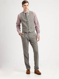An incredibly handsome design tailored for the true gentleman of style in a sumptuous wool blend, finished with a smooth rayon back panel to perfect the streamlined fit.Button-frontWaist flap pocketsViscose/wool/polyester/silkMachine washMade in USA An incredibly handsome design tailored for the true gentleman of style in a sumptuous wool blend, finished with a smooth rayon back panel to perfect the streamlined fit.Button-frontWaist flap pocketsViscose/wool/polyester/silkMachine washMade in USA