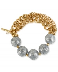 The ball's in your court with this half stretch bracelet from Kenneth Cole New York. Crafted from gold-tone mixed metal with silver-colored glitter beads. Item comes packaged in a signature Kenneth Cole New York Gift Box. Approximate diameter: 2-1/2 inches. The ball's in your court with this half stretch bracelet from Kenneth Cole New York. Crafted from gold-tone mixed metal with silver-colored glitter beads. Item comes packaged in a signature Kenneth Cole New York Gift Box. Approximate diameter: 2-1/2 inches.