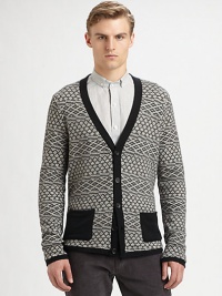 Part statement piece and part layering piece, this cardigan features a great pattern and patch pockets.V-necklineRaglan sleevesButton frontAllover patternSolid trim and pockets90% cotton/10% woolMachine washImported Part statement piece and part layering piece, this cardigan features a great pattern and patch pockets.V-necklineRaglan sleevesButton frontAllover patternSolid trim and pockets90% cotton/10% woolMachine washImported
