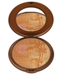 All-over powder bronzer great for face, body and décolleté with a limited edition bamboo design. Inspired by the desert sun and exotic mirages, accents of gold, copper and pink come together for a glowing, sun-kissed complexion. Swirl Powder Brush #1 on the bronzer compact and apply to the top of the forehead, temples, and underneath the cheekbones. Continue to the jawline and on the bridge of the nose. Use Highlight Brush #3 and apply the gold shade portion to the apples of the cheeks for a shimmery glow. A natural, sun-kissed look with sensually luminous and silky skin. Summer 2012 collection. All-over powder bronzer great for face, body and décolleté with a limited edition bamboo design. Inspired by the desert sun and exotic mirages, accents of gold, copper and pink come together for a glowing, sun-kissed complexion. Swirl Powder Brush #1 on the bronzer compact and apply to the top of the forehead, temples, and underneath the cheekbones. Continue to the jawline and on the bridge of the nose. Use Highlight Brush #3 and apply the gold shade portion to the apples of the cheeks for a shimmery glow. A natural, sun-kissed look with sensually luminous and silky skin. Summer 2012 collection.