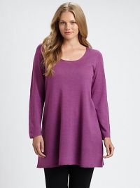 Offering you a more elongated silhouette, a brilliant, a merino wool tunic with a feminine neckline. It would look amazing with leggings or skinnies. ScoopneckLong sleevesPull-on styleAbout 33 from shoulder to hemMerino woolDry cleanImported of Italian fabric Offering you a more elongated silhouette, a brilliant, a merino wool tunic with a feminine neckline. It would look amazing with leggings or skinnies. ScoopneckLong sleevesPull-on styleAbout 33 from shoulder to hemMerino woolDry cleanImported of Italian fabric