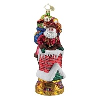 Santa is on his way down the chimney to deliver gifts in this detailed holiday ornament. Santa is on his way down the chimney to deliver gifts in this detailed holiday ornament.
