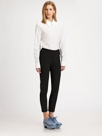 Clean, crisp and tailored for a slimmer silhouette, this lightweight cotton style is finished with just a hint of stretch for an easy, flattering fit.Point collarLong sleevesFlat frontCenter back zipper98% cotton/2% spandexDry cleanMade in ItalyModel shown is 5'9½ (175cm) wearing US size 4. Clean, crisp and tailored for a slimmer silhouette, this lightweight cotton style is finished with just a hint of stretch for an easy, flattering fit.Point collarLong sleevesFlat frontCenter back zipper98% cotton/2% spandexDry cleanMade in ItalyModel shown is 5'9½ (175cm) wearing US size 4.