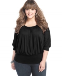 A gathered front lends a flattering fit to Soprano's three-quarter sleeve plus size top, punctuated by a banded hem-- sport it with your fave jeans! A gathered front lends a flattering fit to Soprano's three-quarter sleeve plus size top, punctuated by a banded hem-- sport it with your fave jeans!