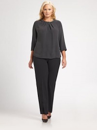 Designed to garner compliments, a lovely silk top offering a relaxed fit. Wear it with your favorite pants or tuck it into your favorite jeans. Embellished detail at pleated necklineThree-quarter sleevesConcealed back zipperAbout 26 from shoulder to hemSilkDry cleanImported Designed to garner compliments, a lovely silk top offering a relaxed fit. Wear it with your favorite pants or tuck it into your favorite jeans. Embellished detail at pleated necklineThree-quarter sleevesConcealed back zipperAbout 26 from shoulder to hemSilkDry cleanImported