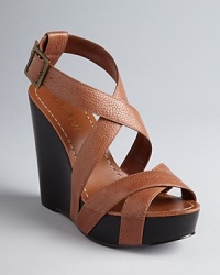 Office or picnic, these Lauren Ralph Lauren wedges easily shift gears, on polished, stacked heels balanced by rugged, strappy uppers. Office or picnic, these Lauren Ralph Lauren wedges easily shift gears, on polished, stacked heels balanced by rugged, strappy uppers.
