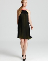 Neon accents and a shapeless silhouette infuse the classic LBD with contemporary edge. Finish off the T Tahari dress with polished pumps for modern femininity. Neon accents and a shapeless silhouette infuse the classic LBD with contemporary edge. Finish off the T Tahari dress with polished pumps for modern femininity.