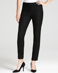 Allover black lace imparts lush dimension to these DKNYC skinny pants. Capture the romantic mood with a silky blouse and embrace decadent dressing. Allover black lace imparts lush dimension to these DKNYC skinny pants. Capture the romantic mood with a silky blouse and embrace decadent dressing.
