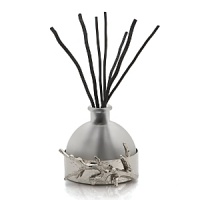 This captivating diffuser by Michael Aram features notes of musk, driftwood, sea spray, white lily, freesia and white rose. Evoking a cool ocean breeze, it's an intoxicating scent for the home. This captivating diffuser by Michael Aram features notes of musk, driftwood, sea spray, white lily, freesia and white rose. Evoking a cool ocean breeze, it's an intoxicating scent for the home.