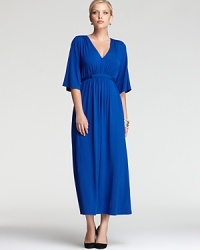 Whimsical bell sleeves and delicate pleats lend a youthful spirit to a Karen Kane Plus maxi dress. Finish with a splash of sparkle for polished yet playful look. Whimsical bell sleeves and delicate pleats lend a youthful spirit to a Karen Kane Plus maxi dress. Finish with a splash of sparkle for polished yet playful look.