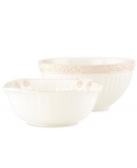 Two of a kind, Butler's Pantry serving bowls add a vintage touch to every gathering. With embossed vines and fluting in one and scalloped detail on the other, this graceful pair shares a soft, feminine look and superior Lenox craftsmanship. Two of a kind, Butler's Pantry serving bowls add a vintage touch to every gathering. With embossed vines and fluting in one and scalloped detail on the other, this graceful pair shares a soft, feminine look and superior Lenox craftsmanship.