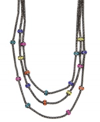 A colorful remix on a stylish classic. Nine West's three-row necklace combines multicolored plastic beads with a hematite-plated mixed metal setting. Approximate length: 18 inches. Approximate drop: 2 inches. A colorful remix on a stylish classic. Nine West's three-row necklace combines multicolored plastic beads with a hematite-plated mixed metal setting. Approximate length: 18 inches. Approximate drop: 2 inches.