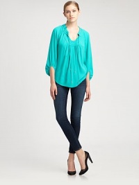 Highlight your femininity in this sumptuous silk blouse with a caftan neckline and billowy bishop sleeves. Caftan necklineSelf-tiesThree-quarter bishop sleevesShirttail hem hits below hipsViscose/rayonDry cleanImportedSIZE & FITModel shown is 5'10 (177cm) wearing US size 4. Highlight your femininity in this sumptuous silk blouse with a caftan neckline and billowy bishop sleeves. Caftan necklineSelf-tiesThree-quarter bishop sleevesShirttail hem hits below hipsViscose/rayonDry cleanImportedSIZE & FITModel shown is 5'10 (177cm) wearing US size 4.