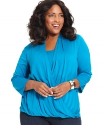 Add instant elegance to your casual wardrobe with Elementz' three-quarter-sleeve plus size top, defined by a faux wrap design. Add instant elegance to your casual wardrobe with Elementz' three-quarter-sleeve plus size top, defined by a faux wrap design.