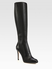 Rich pebble-grain leather forms this tall silhouette resting on a sky-high heel. Self-covered heel, 4 (100mm)Shaft, 16Leg circumference, 13½Leather upperBack zipLeather lining and solePadded insoleMade in Italy Rich pebble-grain leather forms this tall silhouette resting on a sky-high heel. Self-covered heel, 4 (100mm)Shaft, 16Leg circumference, 13½Leather upperBack zipLeather lining and solePadded insoleMade in Italy