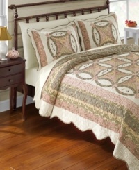 Soothing and casual in lovely shades of pink and green, this Lola sham boasts textural quilting with a dainty floral motif for a beautiful presentation. Finished with scalloped edges for even more style. Soothing and casual in lovely shades of pink and green, this Lola sham boasts textural quilting with a dainty floral motif for a beautiful presentation. Finished with scalloped edges for even more style.