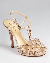 Strappy, snakeskin embossed leather makes a sassy statement on kate spade new york's Renee sandals. Strappy, snakeskin embossed leather makes a sassy statement on kate spade new york's Renee sandals.