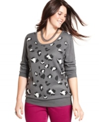 Cause a roar in Belle Du Jour's long sleeve plus size sweater, featuring an animal-print.