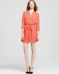 An elegant Theory dress, belted for a classic shirtdress silhouette, in whisper-light silk. An elegant Theory dress, belted for a classic shirtdress silhouette, in whisper-light silk.