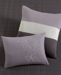 Bold and modern, this Calvin Klein decorative pillow features tonal bands in stylish plum tones. Pillow comes stuffed and features an envelope closure. Bold and modern, this Calvin Klein decorative pillow features tonal bands in stylish plum tones. Pillow comes stuffed and features an envelope closure.