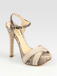 Python silhouette with braided leather straps and an adjustable slingback. Self-covered heel, 5 (125mm)Covered platform, 1½ (40mm)Compares to a 3½ heel (90mm)Python and leather upperLeather lining and solePadded insoleImportedOUR FIT MODEL RECOMMENDS ordering one size up as this style runs small. Python silhouette with braided leather straps and an adjustable slingback. Self-covered heel, 5 (125mm)Covered platform, 1½ (40mm)Compares to a 3½ heel (90mm)Python and leather upperLeather lining and solePadded insoleImportedOUR FIT MODEL RECOMMENDS ordering one size up as this style runs small.