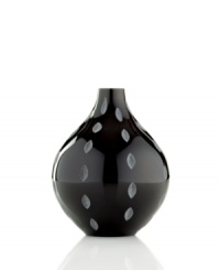 Laced with wedge cuts in black crystal, the Stitch vase from Sasaki lends minimalist allure to modern interiors. Laced with wedge cuts in black crystal, the Stitch vase from Sasaki lends minimalist allure to modern interiors.