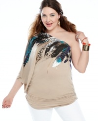 Soar above the style set with Baby Phat's one-shoulder plus size top, highlighted by a feather print. Soar above the style set with Baby Phat's one-shoulder plus size top, highlighted by a feather print.