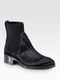 Exude cool from tip to toe with this lush calf hair ankle boot, lifted by a stacked heel and platform. Stacked heel, 1¾ (45mm)Stacked platform, ½ (15mm)Compares to a 1¼ heel (30mm)Calf hair and scuba nylon upperPull-on styleLeather liningLeather and rubber solePadded insoleMade in Italy Exude cool from tip to toe with this lush calf hair ankle boot, lifted by a stacked heel and platform. Stacked heel, 1¾ (45mm)Stacked platform, ½ (15mm)Compares to a 1¼ heel (30mm)Calf hair and scuba nylon upperPull-on styleLeather liningLeather and rubber solePadded insoleMade in Italy