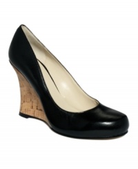 With their chic, retro-inspired design, Nine West's BeeOut wedge pumps stand out in a crowd! A narrow cork wedge takes the look one step further. With their chic, retro-inspired design, Nine West's BeeOut wedge pumps stand out in a crowd! A narrow cork wedge takes the look one step further.