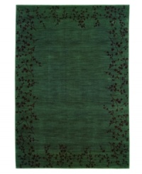 Latticed with vinery in deep maroon tones on a blue-green ground, this elegant transitional rug brings beauty to any room in your home. Cross-woven in resilient nylon for a luxuriously soft feel and long-lasting allure. Latticed with vinery in deep maroon tones on a blue-green ground, this elegant transitional rug brings beauty to any room in your home. Cross-woven in resilient nylon for a luxuriously soft feel and long-lasting allure.