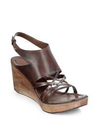 THE LOOKCutout leather upperAdjustable slingback strap with stud closureWooden wedge, 4½ (115mm)Wooden platform, 1 (25mm)Compares to a 3½ heel (90mm)THE MATERIALCalf leather upperLeather liningLeather and rubber soleORIGINMade in Italy THE LOOKCutout leather upperAdjustable slingback strap with stud closureWooden wedge, 4½ (115mm)Wooden platform, 1 (25mm)Compares to a 3½ heel (90mm)THE MATERIALCalf leather upperLeather liningLeather and rubber soleORIGINMade in Italy