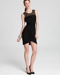 Wrap your style around this Plenty by Tracy Reese party dress. The glossy metallic yoke is an edgy counterpoint to the feminine drape and curve-enhancing wrap-around silhouette. Wrap your style around this Plenty by Tracy Reese party dress. The glossy metallic yoke is an edgy counterpoint to the feminine drape and curve-enhancing wrap-around silhouette.