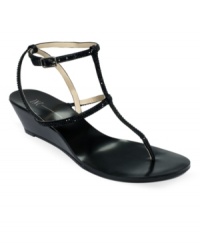 Minimal straps, maximum style. The straps of the Madge wedge sandals by INC International Concepts are covered in jeweled accents, for a look that's as sparkly as it is trendy. Minimal straps, maximum style. The straps of the Madge wedge sandals by INC International Concepts are covered in jeweled accents, for a look that's as sparkly as it is trendy.