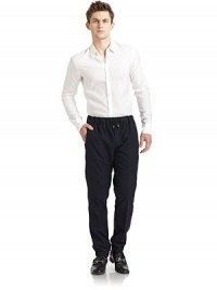 THE LOOKWide elastic waistband with drawstring tiesButton flyDual seam pocketsElastic cuffsBack flap pocketTHE FITRise, about 10Inseam, about 29½THE MATERIAL62% cotton/38% woolCARE & ORIGINDry cleanMade in Italy THE LOOKWide elastic waistband with drawstring tiesButton flyDual seam pocketsElastic cuffsBack flap pocketTHE FITRise, about 10Inseam, about 29½THE MATERIAL62% cotton/38% woolCARE & ORIGINDry cleanMade in Italy