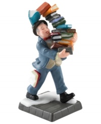 An avid reader makes out like a champ, carrying more than an armful of books away from the big holiday sale at Wakefield Books. A familiar sight in the city throughout the holiday season, from Department 56. An avid reader makes out like a champ, carrying more than an armful of books away from the big holiday sale at Wakefield Books. A familiar sight in the city throughout the holiday season, from Department 56.