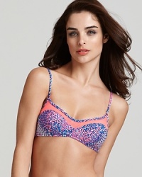 Vamp it up while you bask in this printed bikini from Nanette Lepore. Its playful print and cute cut are sure to make waves whether you're poolside or somewhere tropical. Vamp it up while you bask in this printed bikini from Nanette Lepore. Its playful print and cute cut are sure to make waves whether you're poolside or somewhere tropical.