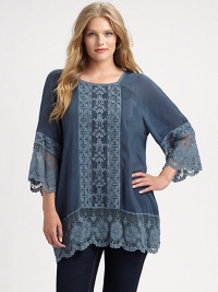 Lovely lace completes this embroidered tunic creating an exquisite design that you will not want to take off.Square neckLong sleevesLace cuffs and hemEmbroidered detailsPull-on styleAbout 32 from shoulder to hemRayonMachine washImported